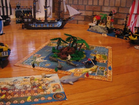 The Pirate's Cove board game can be played using Pirate LEGO ships and islands