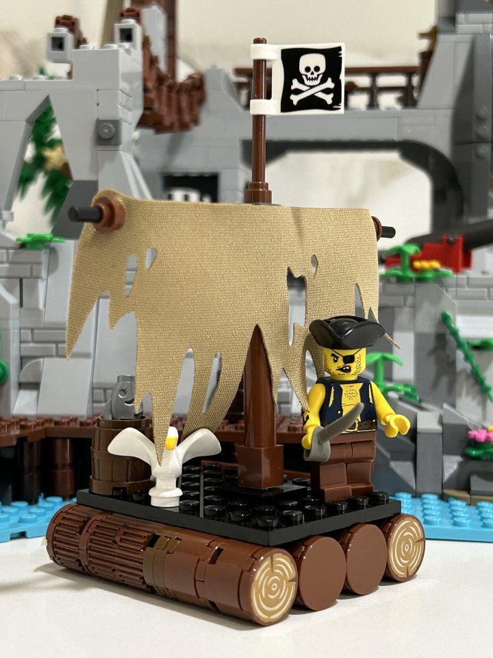 The Raft with Captain DarkNStormy's Rock Island Refuge in the background