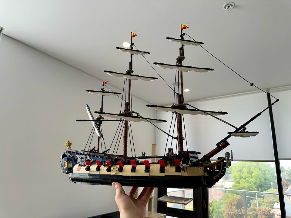 Holding "Privateer Frigate Fortuna" in a single hand
