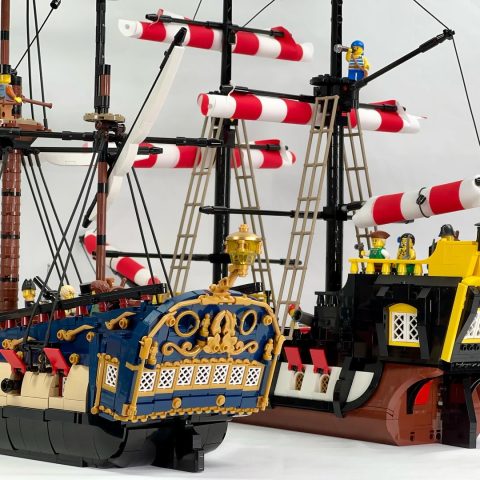 Close-ups of the sterns of the 21322 Black Seas Barracuda and Series 6 "Fortuna"