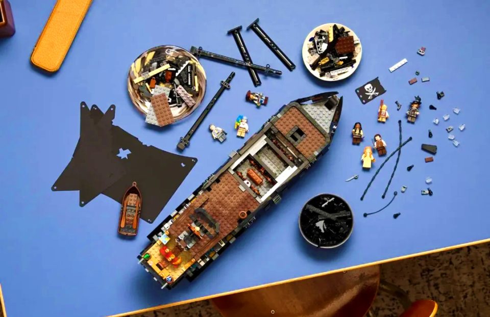 Top-down view of the parts of 10365 Jack Sparrow's Pirate Ship spread across a table