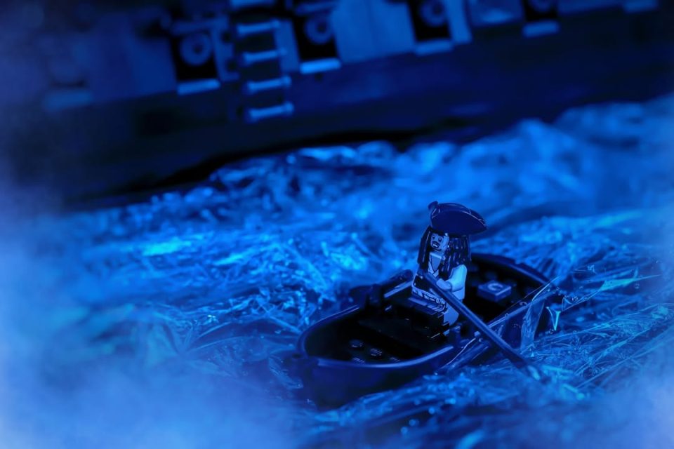 Jack Sparrow minifigure rowing a boat - by_anna