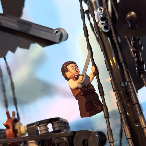 Will Turner minfig hanging from mast of LEGO Icons 10365 Captain Jack Sparrows Pirate Ship (2)
