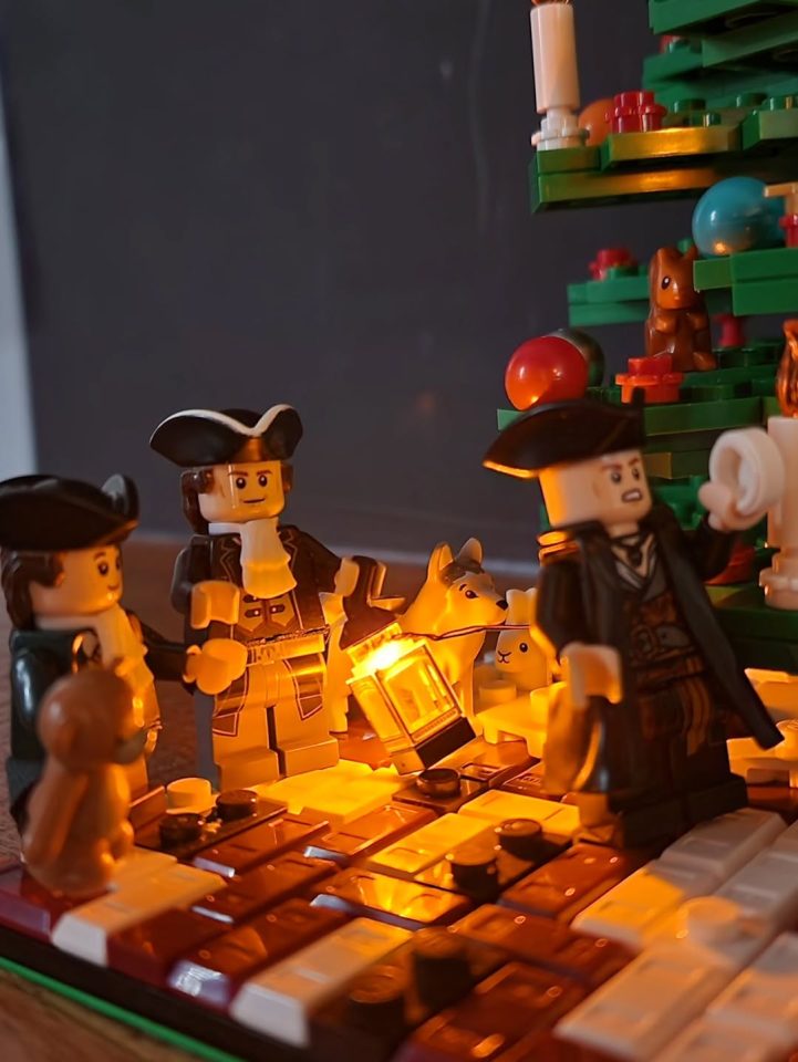 Close-up of camp fire in "Colonists Coming Together for Christmas" by ruddellcreations18
