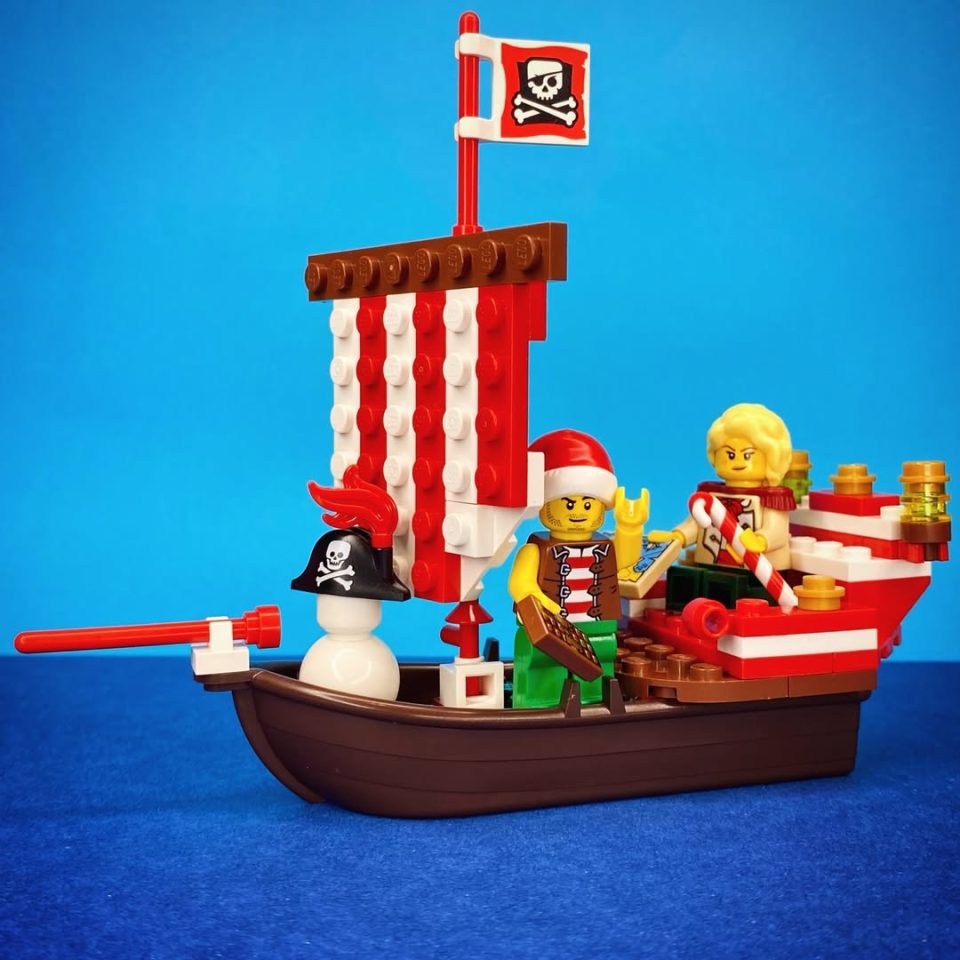 Wider shot of Bo'Sun Will and Camilla minifigures onboard "The Jolly Santa" by captain_brixx