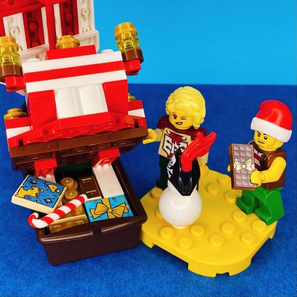 Bo'Sun Will and Camilla minifigures near Christmas treasure chest of "The Jolly Santa" by captain_brixx
