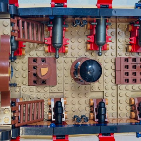 Shooting cannons on 910059 Privateer Frigate Fortuna by Brick Perfection