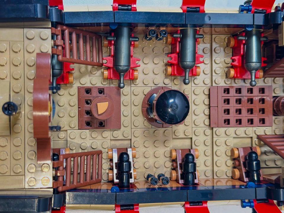 Shooting cannons on 910059 Privateer Frigate Fortuna by Brick Perfection 