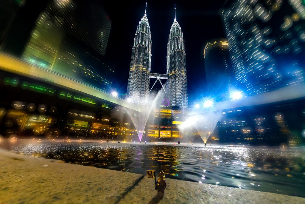 Mister Phes posing in front of Petronas Towers, Kuala Lumpur, Malaysia