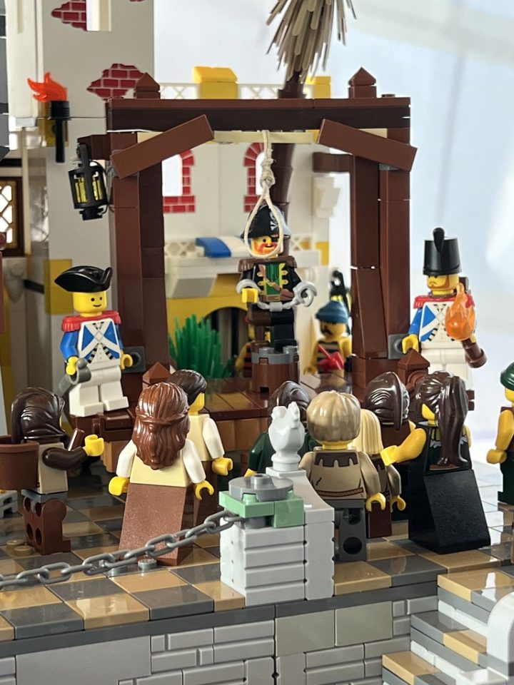 Captain Redbeard on the gallows in a noose at Port Royal
