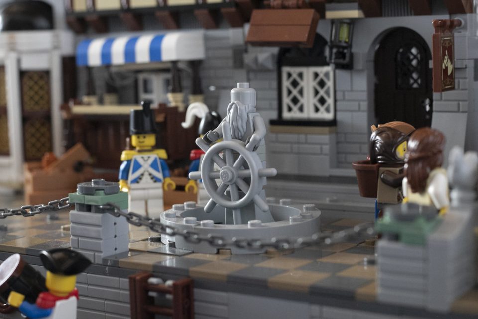 Click here to enlarge image Outside the tavern at Port Royal